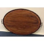 A large Georgian oval tea tray with shaped gallery