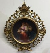 A rare circular gilt framed Berlin porcelain plaqu