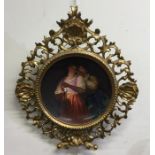 A rare circular gilt framed Berlin porcelain plaqu