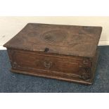 An Antique oak hinged top small bible box on turne