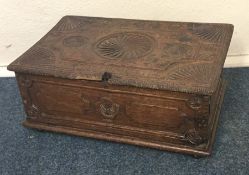 An Antique oak hinged top small bible box on turne