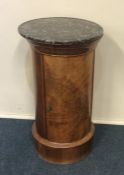 An unusual Continental mahogany pot cupboard with