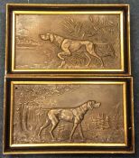 A pair of good quality brass plaques in the form o