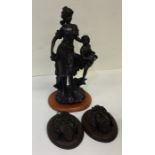 Two spelter mounted busts on panels together with