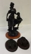 Two spelter mounted busts on panels together with