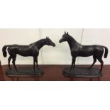 A good pair of bronze figures of horses in standin