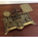 A good pair of brass letter scales with scroll dec