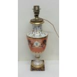 An attractive porcelain table lamp decorated with