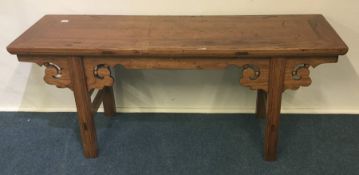 A Continental hardwood hall table. Est. £80 - £120