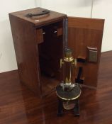 A mahogany cased Karl Zeiss microscope. Est. £200