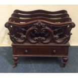 A good quality Victorian rosewood Canterbury with