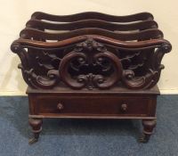 A good quality Victorian rosewood Canterbury with