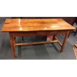 A good fruit wood dining table with plank top and