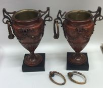 A pair of attractive bronze urns mounted with stag
