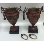 A pair of attractive bronze urns mounted with stag