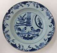 A Chinese Nankin decorated plate depicting fightin