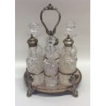 A good quality silver plated six bottle cruet with