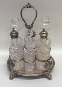 A good quality silver plated six bottle cruet with