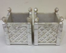 An attractive pair of MOP square planters with wea