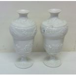 A pair of good white glazed vases decorated with f