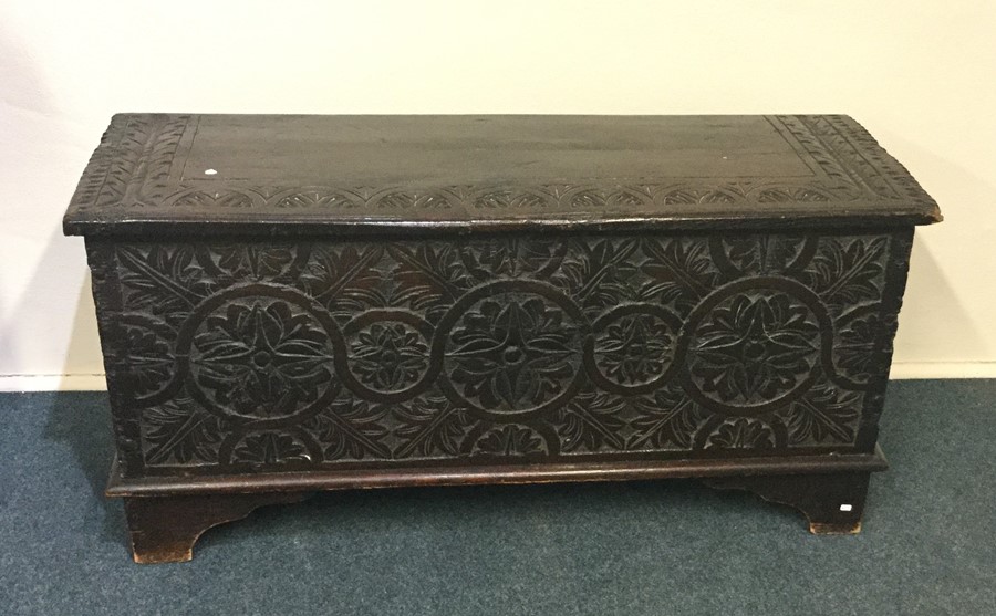 An early Georgian hinged top coffer decorated with