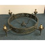 A large pewter light fitting. Est. £20 - £30.
