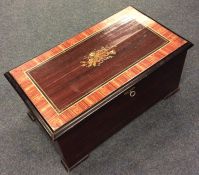 A large French hinged top music box decorated with