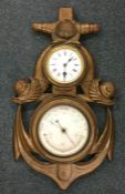 An unusual clock / barometer decorated with an anc