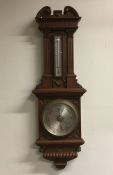 A good quality oak cased barometer. Retailed by Se