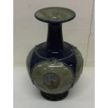 A Royal Doulton baluster shaped vase of typical fo