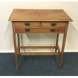 An Edwardian three drawer bedside chest with inlai