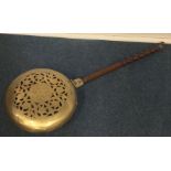 An Antique 18th Century brass warming pan of circu