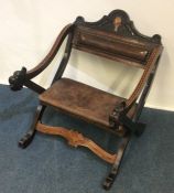 An unusual Continental low chair with parquetry de