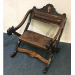 An unusual Continental low chair with parquetry de