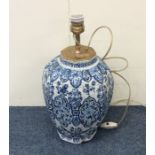 A large blue and white Dutch vase mounted as a lam