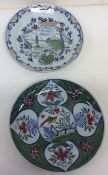 A pair of 18th Century Delft decorative circular w