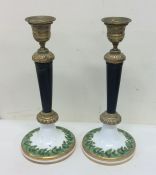 A pair of French, brass and porcelain mounted cand