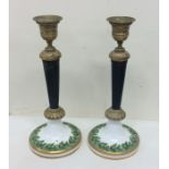 A pair of French, brass and porcelain mounted cand