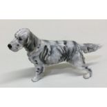 A Royal Doulton figure of a grey Irish Setter dog.