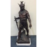 A massive spelter figure of a warrior on marble ba