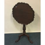 A mahogany shaped edge pie crust tilt top tripod t