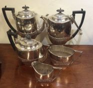 A good half fluted silver plated six piece coffee