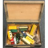 A box containing Dinky toys. Est. £20 - £30.