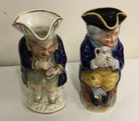 A good pair of pottery Toby jugs with gilt decorat