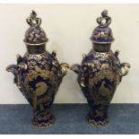 A good tall pair of blue ground Worcester vases at