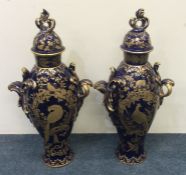 A good tall pair of blue ground Worcester vases at