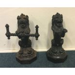 A good pair of cast iron door stops in the form of