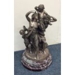 A good circular silvered bronze group of figures o