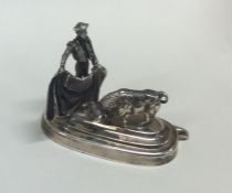 A small miniature silver model of a Matador. Appro