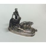 A small miniature silver model of a Matador. Appro